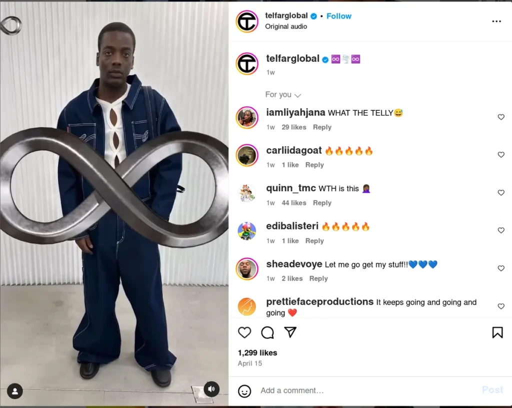 fashion brand instagram post featuring person in blue outfit holding large metal infinity symbol, minimal caption with infinity emojis, showing how symbolic one-word instagram caption ideas can create intrigue