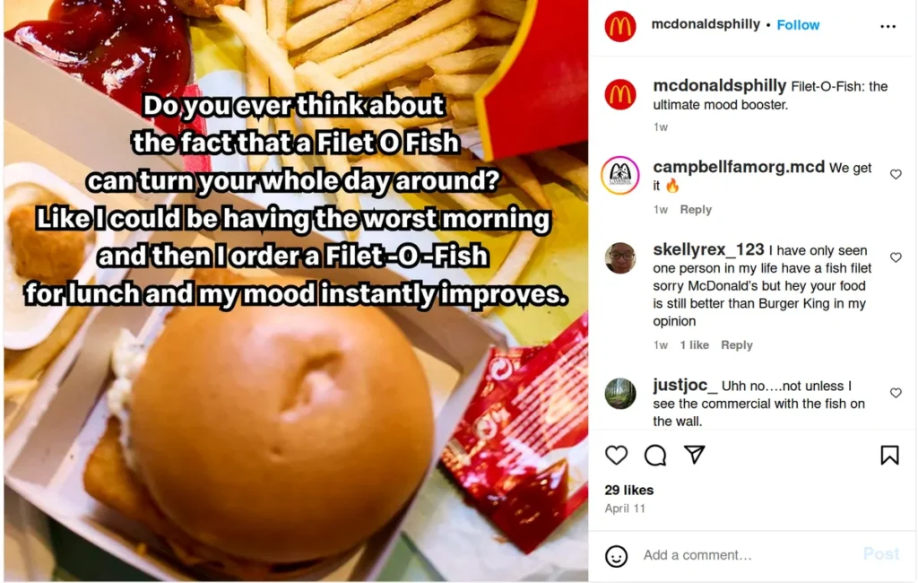 mcdonalds philly instagram post featuring close-up of filet-o-fish sandwich with fries, overlay text reads "do you ever think about the fact that a filet o fish can turn your whole day around," caption simply states "filet-o-fish: the ultimate mood booster," demonstrating how short instagram captions can effectively highlight comfort food as a mood-enhancing experience