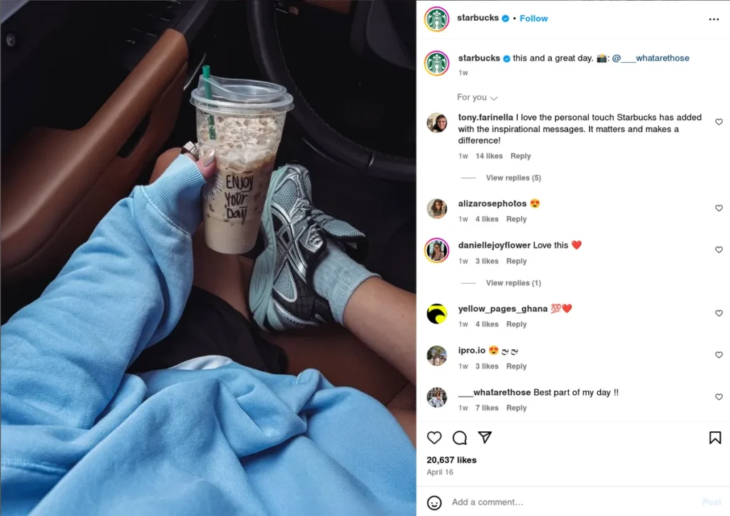 starbucks instagram post showing person holding iced coffee cup with "enjoy your day" handwritten on it in car setting, simple caption "this and a great day," demonstrating how short instagram captions can create relatable moments that resonate with followers looking for inspirational content to accompany their daily coffee ritual
